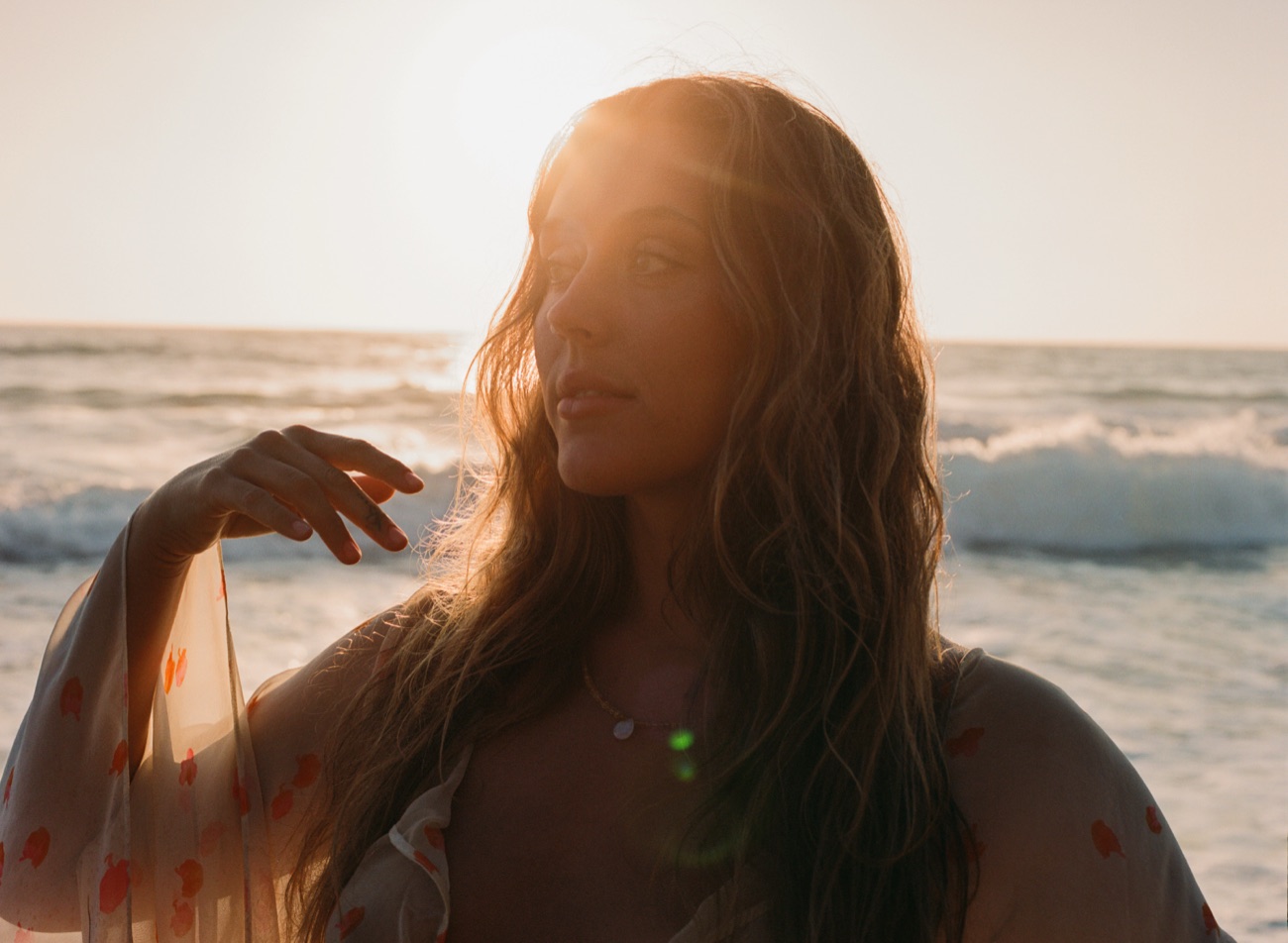 Alaya Moon at the shoreline in golden hour light